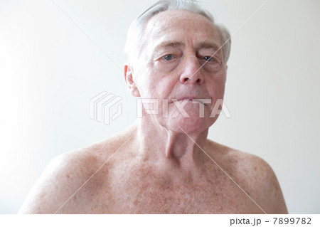 Portrait of topless senior man 7899782