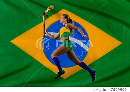 Brazilian runner carrying Olympic torch 7899995