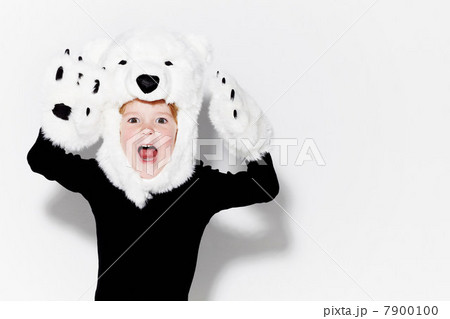 Boy wearing bear head and claws Boy wearing bear head and claws 7900100
