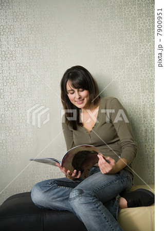 Teenage girl reading magazine Teenage girl reading magazine 7900951