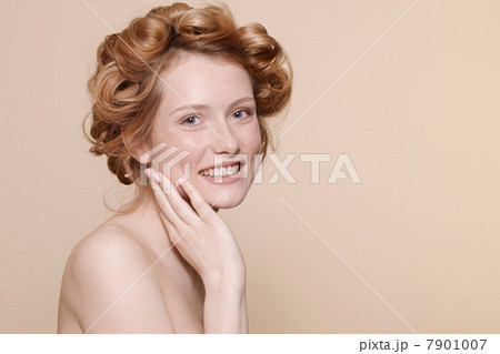Young woman with curly red hair, portrait Young woman with curly red hair, portrait 7901007