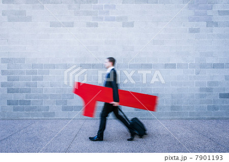 Businessman holding red number one 7901193