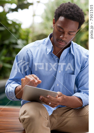 Man using digital tablet Man using digital tablet 7901505