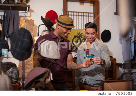 Two young men in vintage shop Two young men in vintage shop 7901602