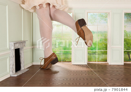 Legs of giant woman in tiny room 7901844