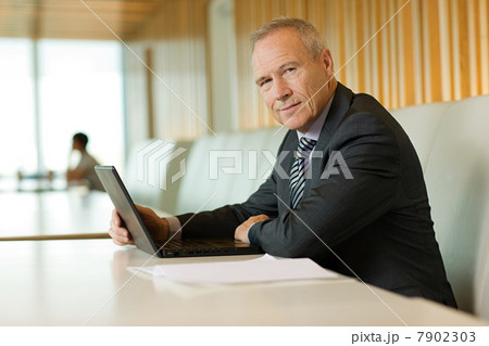 Businessman with laptop Businessman with laptop 7902303