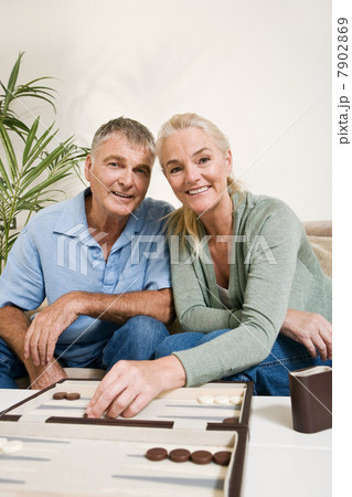 Couple playing backgammon 7902869