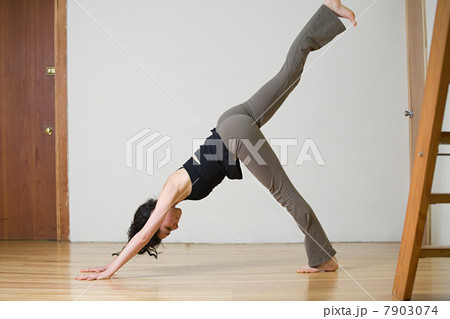 Woman practicing yoga 7903074