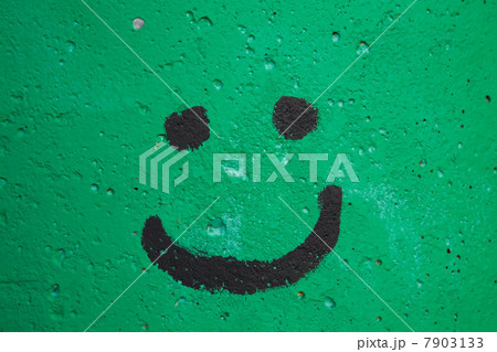 Smiley face on green cement Smiley face on green cement 7903133
