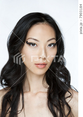 Young woman with black eye makeup 7903184