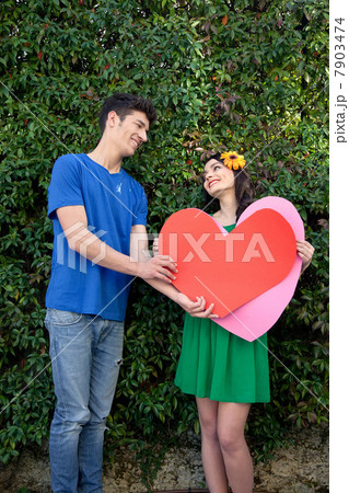 Couple holding heart shape Couple holding heart shape 7903474