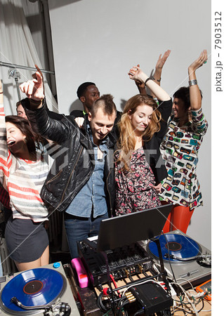 Disc jockeys dancing at party 7903512