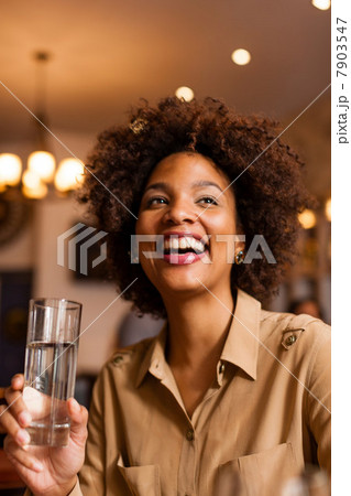 Woman having a drink 7903547
