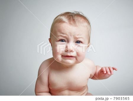 Baby boy looking upset 7903565
