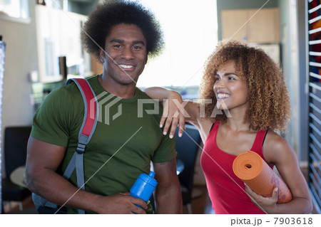 Mid adult woman and mature man in sportswear, portrait Mid adult woman and mature man in sportswear, portrait 7903618
