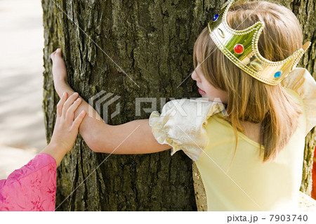 Girl wearing crown dressed up as queen Girl wearing crown dressed up as queen 7903740