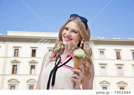 Young woman with ice cream cone 7903984