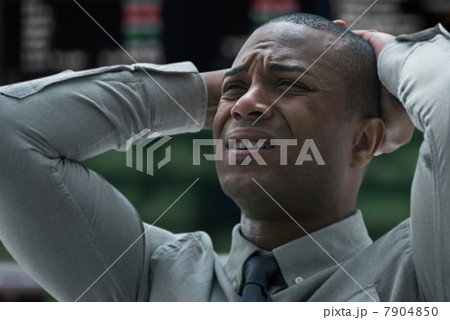 Stressed businessman at stock exchange 7904850
