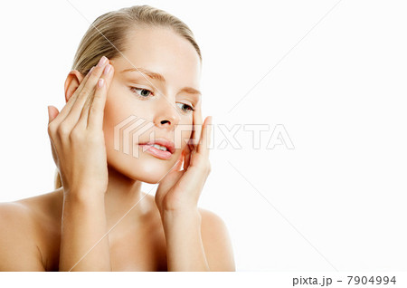 Young woman contemplating face lift Young woman contemplating face lift 7904994