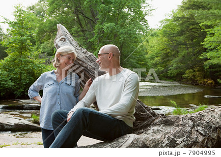 Mature couple outdoors in rural scene Mature couple outdoors in rural scene 7904995