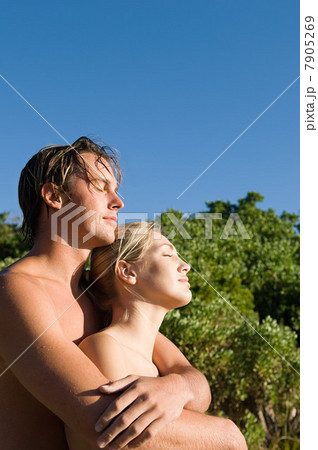 Young couple embracing, eyes closed Young couple embracing, eyes closed 7905269