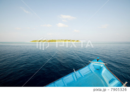 Boat and Havodigalaa Island, South Huvadhu Atoll, Maldives 7905326