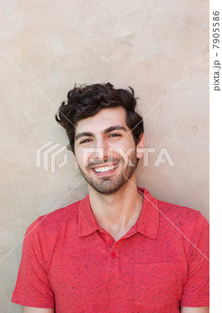 Portrait of young man in front of wall Portrait of young man in front of wall 7905586
