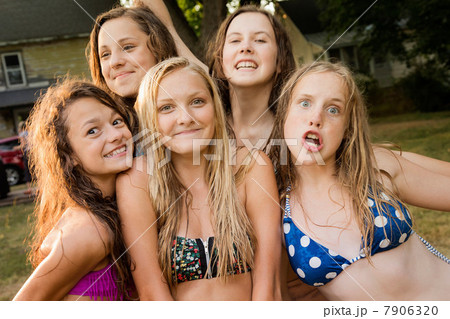 Portrait of five girls wearing bikini tops 7906320