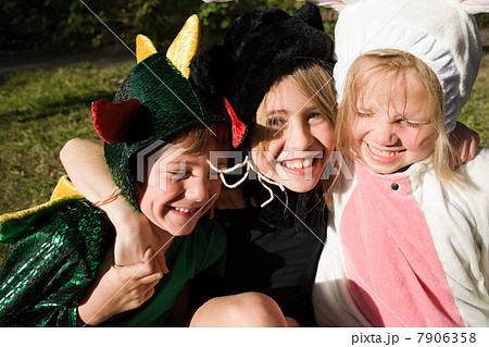 Three children in fancy dress costume 7906358