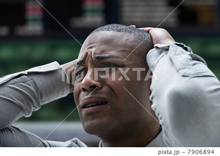 Stressed businessman at stock exchange 7906894