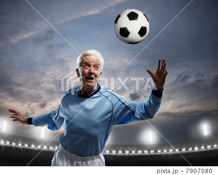 Senior man playing football Senior man playing football 7907080