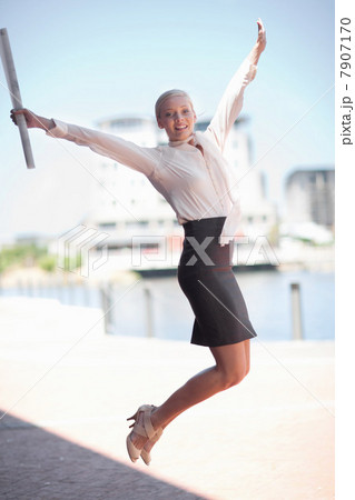 Businesswoman jumping for joy Businesswoman jumping for joy 7907170