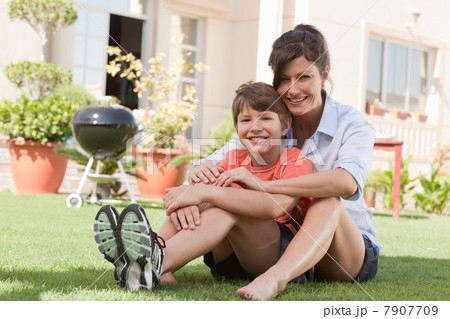 Mother and son in the garden Mother and son in the garden 7907709