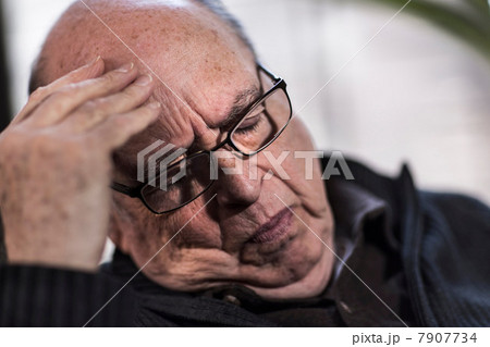 Senior man with eyes closed, wearing glasses, looking stressed Senior man with eyes closed, wearing glasses, looking stressed 7907734