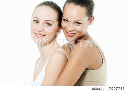 Two young women hugging Two young women hugging 7907735