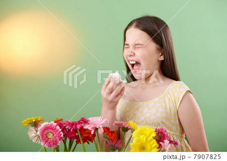 Girl with flowers sneezing Girl with flowers sneezing 7907825