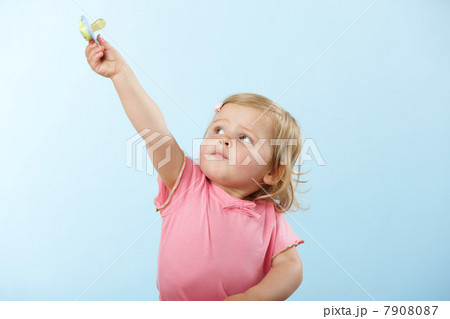 Girl holding pacifier 7908087
