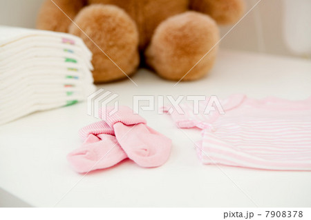 Baby clothes and bear Baby clothes and bear 7908378