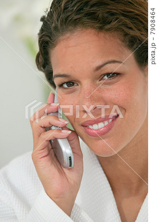 Woman using cellphone Woman using cellphone 7908464