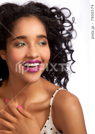 Young woman looking away and smiling against white background 7908574