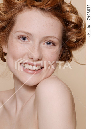 Young woman with curly red hair, portrait Young woman with curly red hair, portrait 7908855