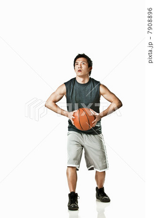 Basketball player holding ball Basketball player holding ball 7908896