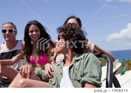 Three young friends in off road vehicle on vacation Three young friends in off road vehicle on vacation 7908974