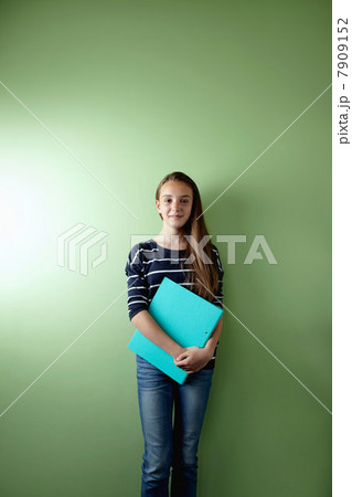 Schoolgirl with ringbinder 7909152
