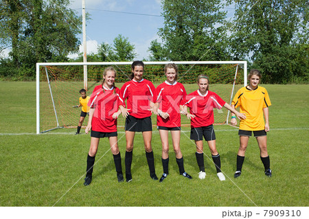 Girl soccer players make defensive wall Girl soccer players make defensive wall 7909310