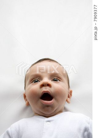 Baby boy yawning 7909377
