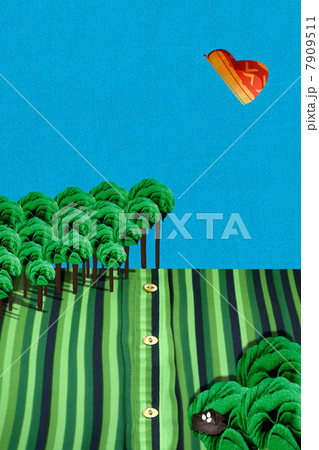 Green striped field with forest and butterfly Green striped field with forest and butterfly 7909511