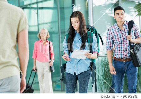 Young female backpacker in airport 7909539