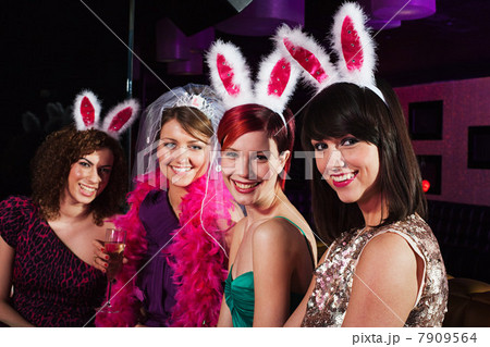 Four young women on hen night 7909564
