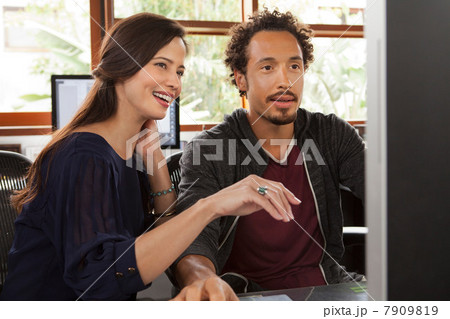 Business colleagues using computer Business colleagues using computer 7909819